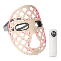 AuraLux Advanced+ LED face mask, cream silicone with a honeycomb lattice, shown with its remote