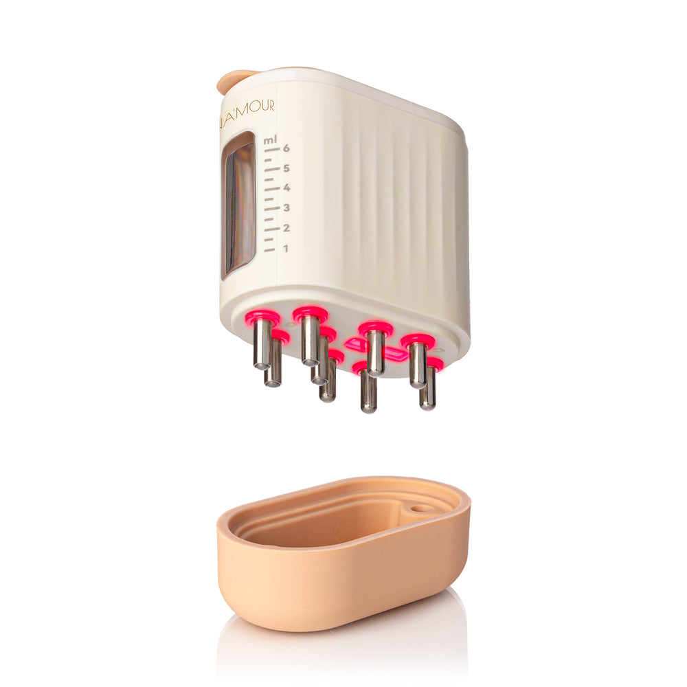 Boost Brush Pro Mini microcurrent scalp massager with built-in serum tank