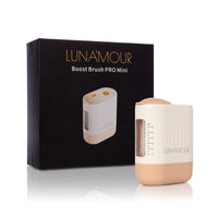 Boost Brush scalp massager shown with its packaging